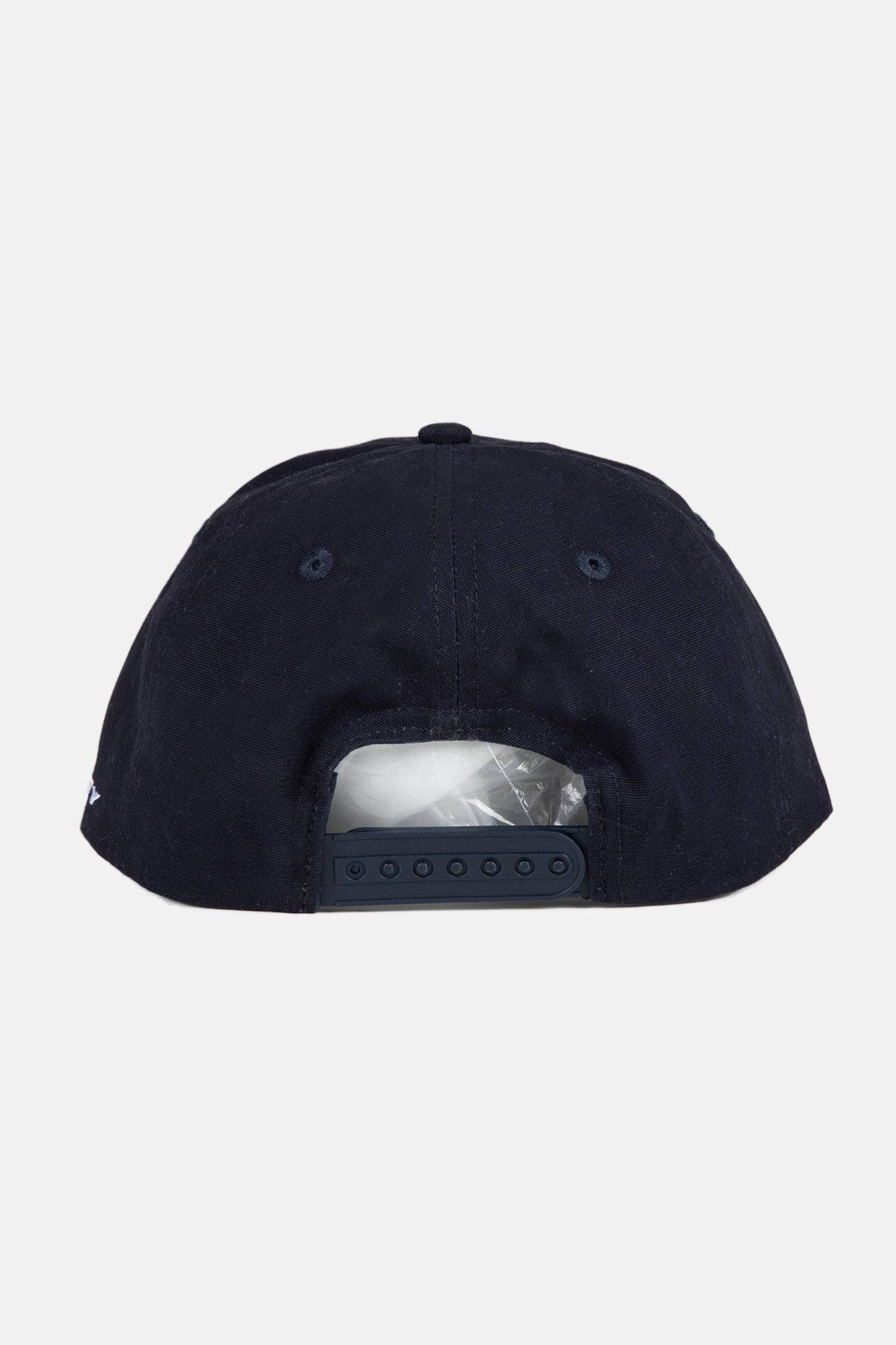 Back view of the Rusty Pipeline Dad Cap featuring adjustable snap closure.