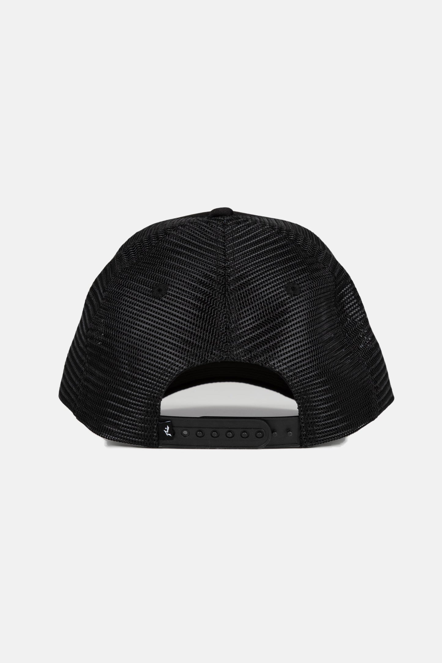 Back view of black Rusty R Dot Trucker Cap with adjustable strap.