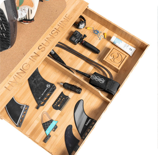 Wooden surfboard storage with tools and accessories drawer