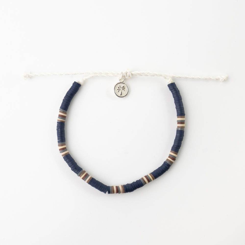 Stylish Pineapple Island anklet FIA-010 with navy and beige beads.
