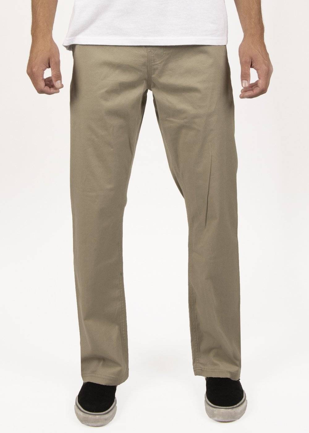 Vissla No See Ums Eco Elastic Pant in khaki, worn front view.