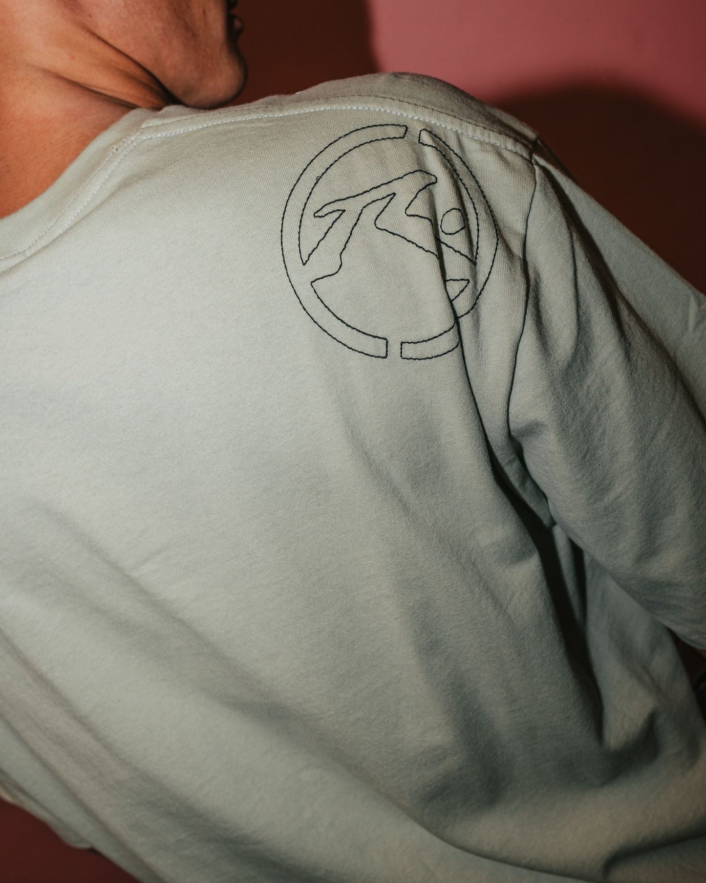 Rusty graphic tee with embroidered logo on shoulder for men