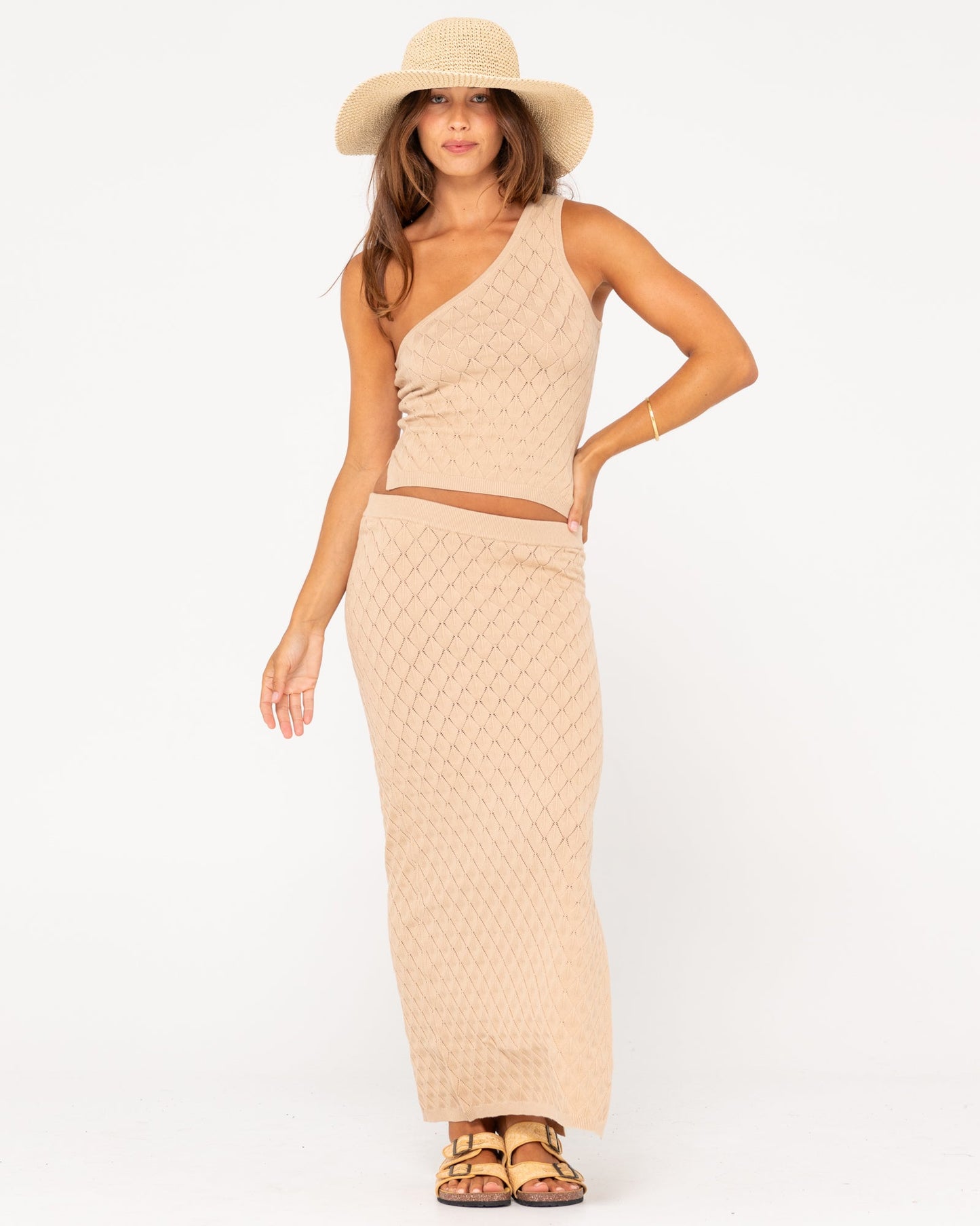 Full outfit view of Rusty Leo Maxi Knit Skirt paired with matching top and hat.