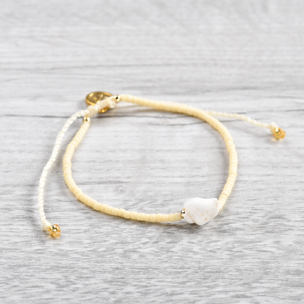 Pineapple Island Shell Bracelet SH-042 with beige beads and shell charm.