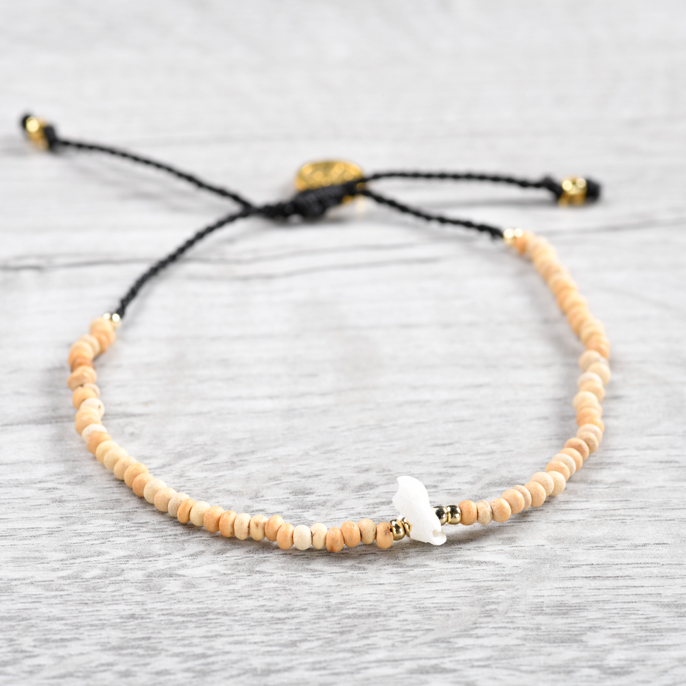Pineapple Island Shell Bracelet SH-044 with beige beads and adjustable black cord.