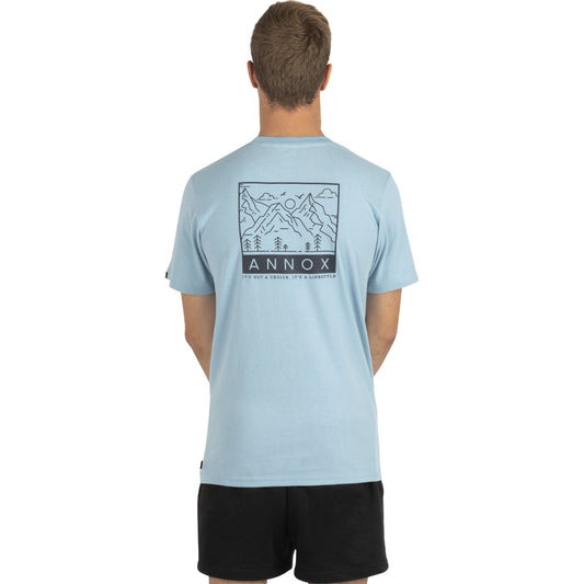 Back view of light blue Annox T-shirt featuring mountain graphic design.