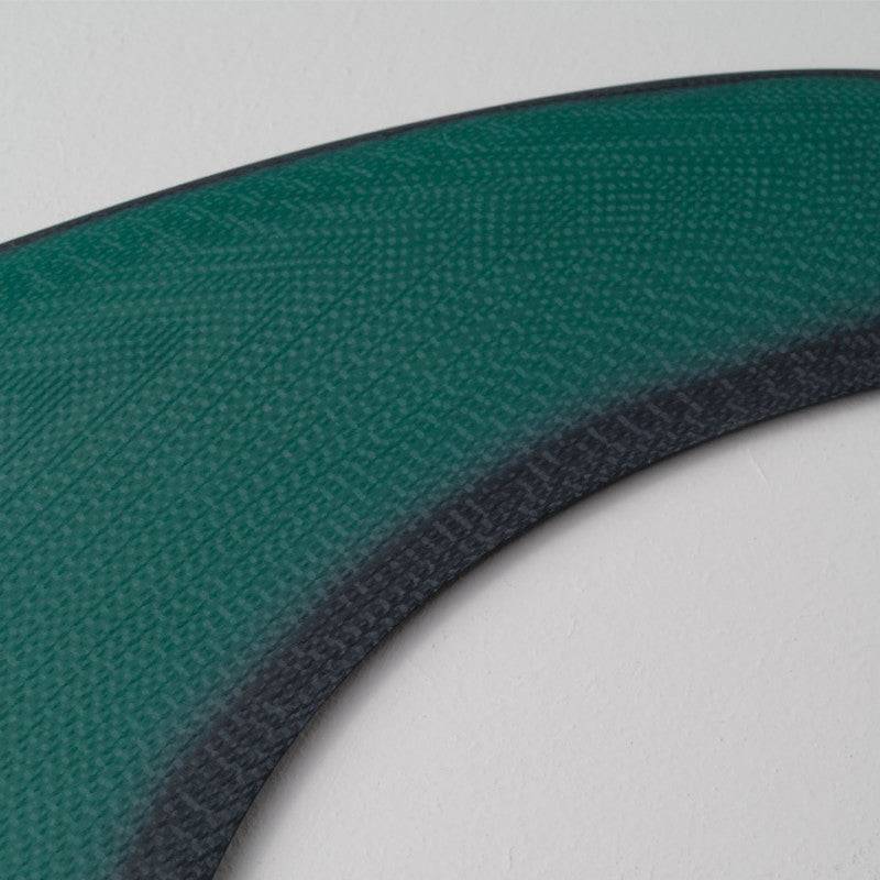 Textured surface detail of Deflow Cream green longboard fin.