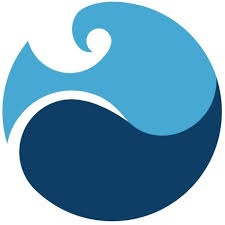 Patented wooden surfboard rack holding five surfboards of varying colors and sizes.