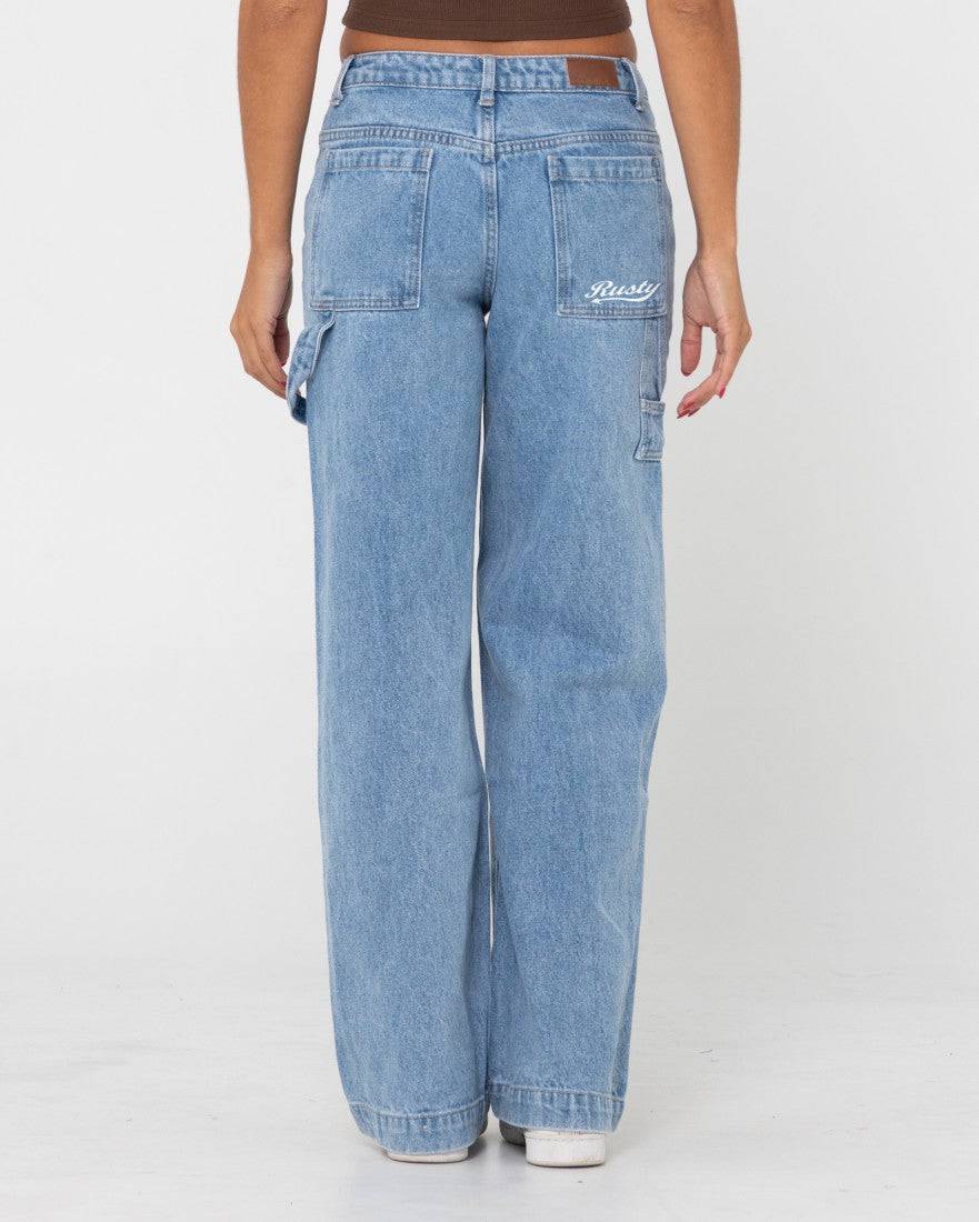 Back view of Rusty Billie Low Rise Carpenter Pant with logo detail.