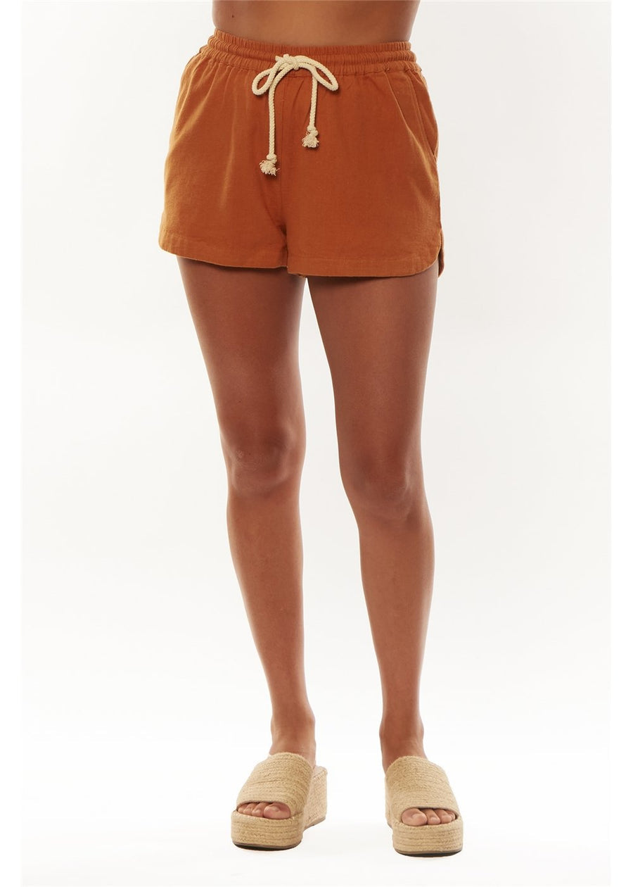 Front view of Sisstrevolution Isla Waves Short in white sand color with drawstring waist.