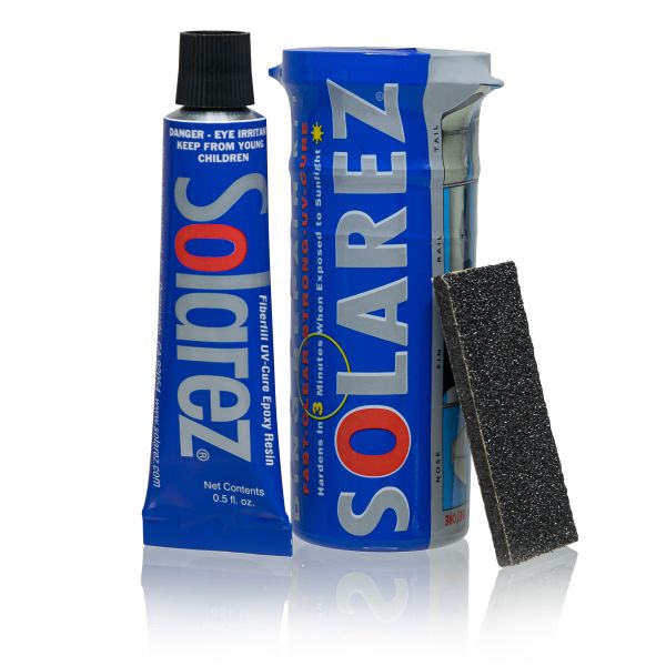 Solarez Epoxy Mini Travel Kit with tube, sanding pad, and case for surfboard repair.