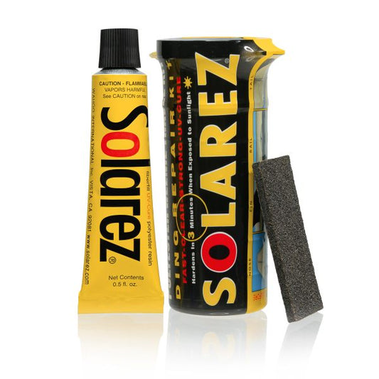 Solarez Polyester Weenie Travel Kit with resin tube, sanding pad, and container.