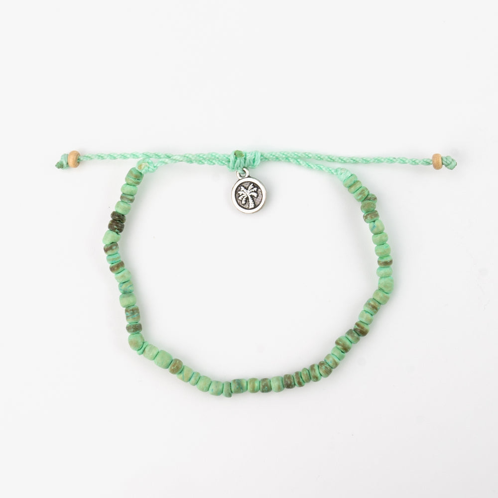 Coconut wood bead bracelet with adjustable cord and button clasp.