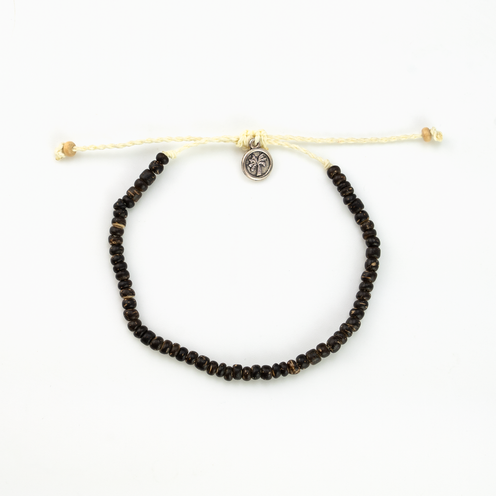 Coconut wood bead bracelet with adjustable cord and button clasp.