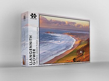 Dan Santillo Llangenith Jigsaw Puzzle box featuring a scenic coastal view of Llangenith with waves and cliffs, 1000-piece puzzle in Toys & Games.