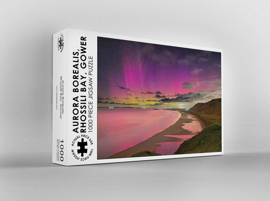 Dan Santillo jigsaw puzzle featuring Rhossili lights with aurora borealis.