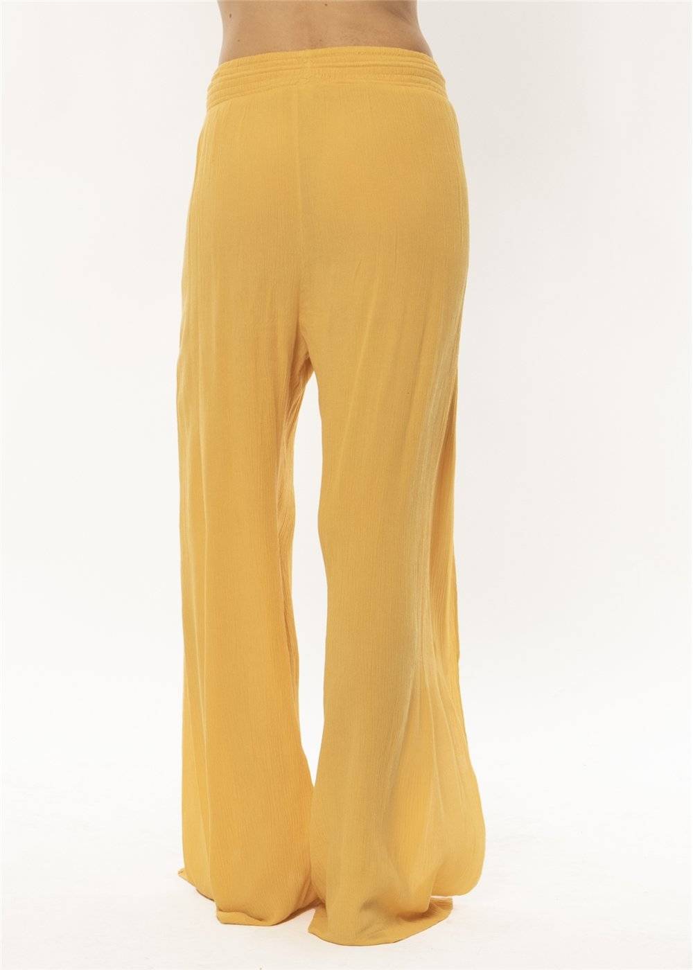 Back view of Sisstrevolution Warm Sand Pant in ginger color, featuring a relaxed fit.