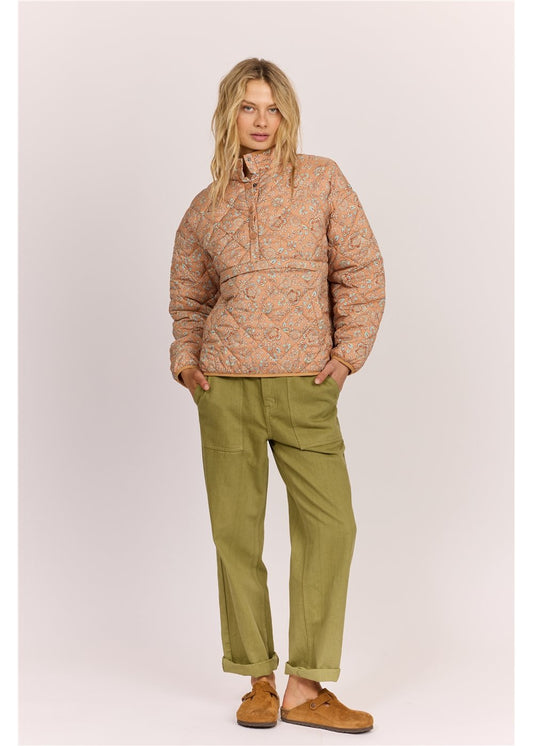 Sisstr Heatin' Up Jacket - sweet clay in 100% polyester with quilted floral pattern, front zip and relaxed fit, styled with green pants.