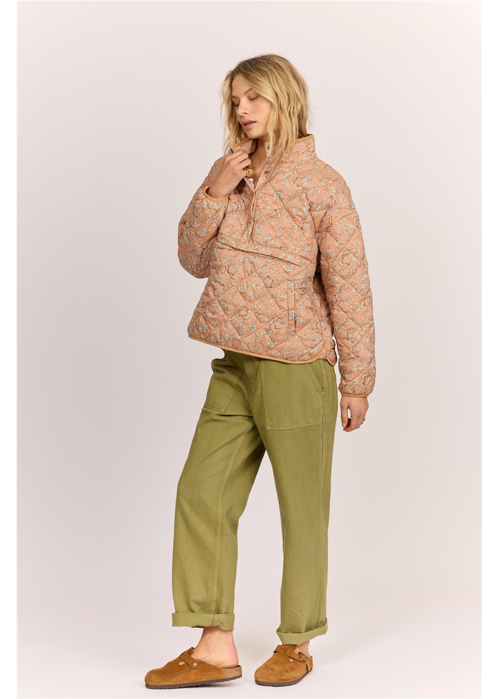 Side view of Sisstr Heatin' Up Jacket - sweet clay, 100% polyester quilted ladies jacket with high collar and front pocket detail.