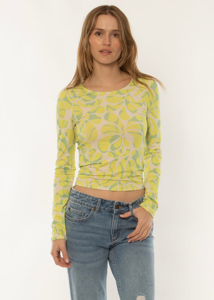 Sisstrevolution Skyscape LS Knit in coral with vibrant abstract print, front view.