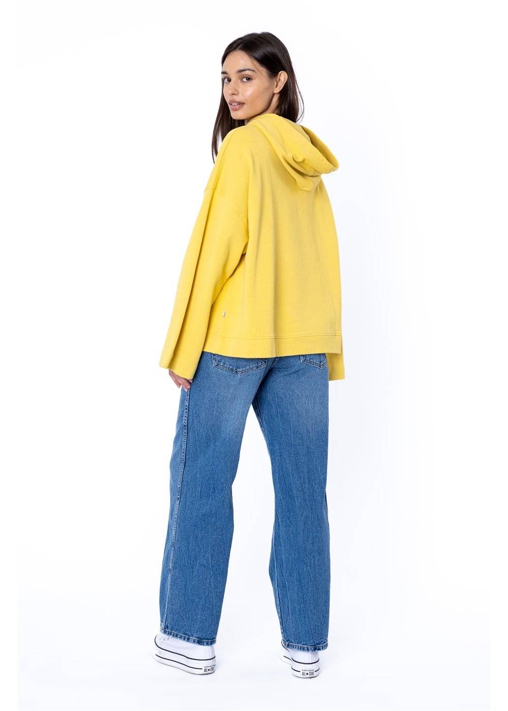 Back view of Sisstr Fort Baker Ls Fleece in yellow, showcasing oversized hood and relaxed fit.