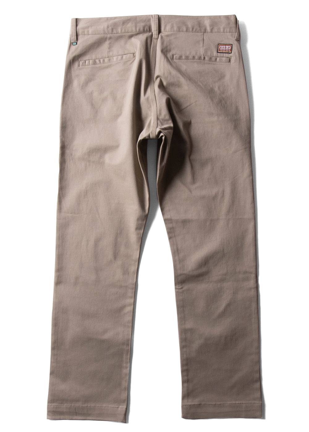 Vissla Creators Port Chino Pant in khaki, back view with pocket details.