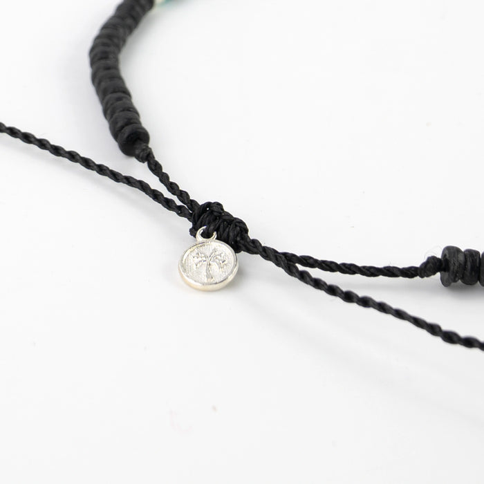 Adjustable clasp of Pineapple Island Marley surf bead necklace with charm detail.