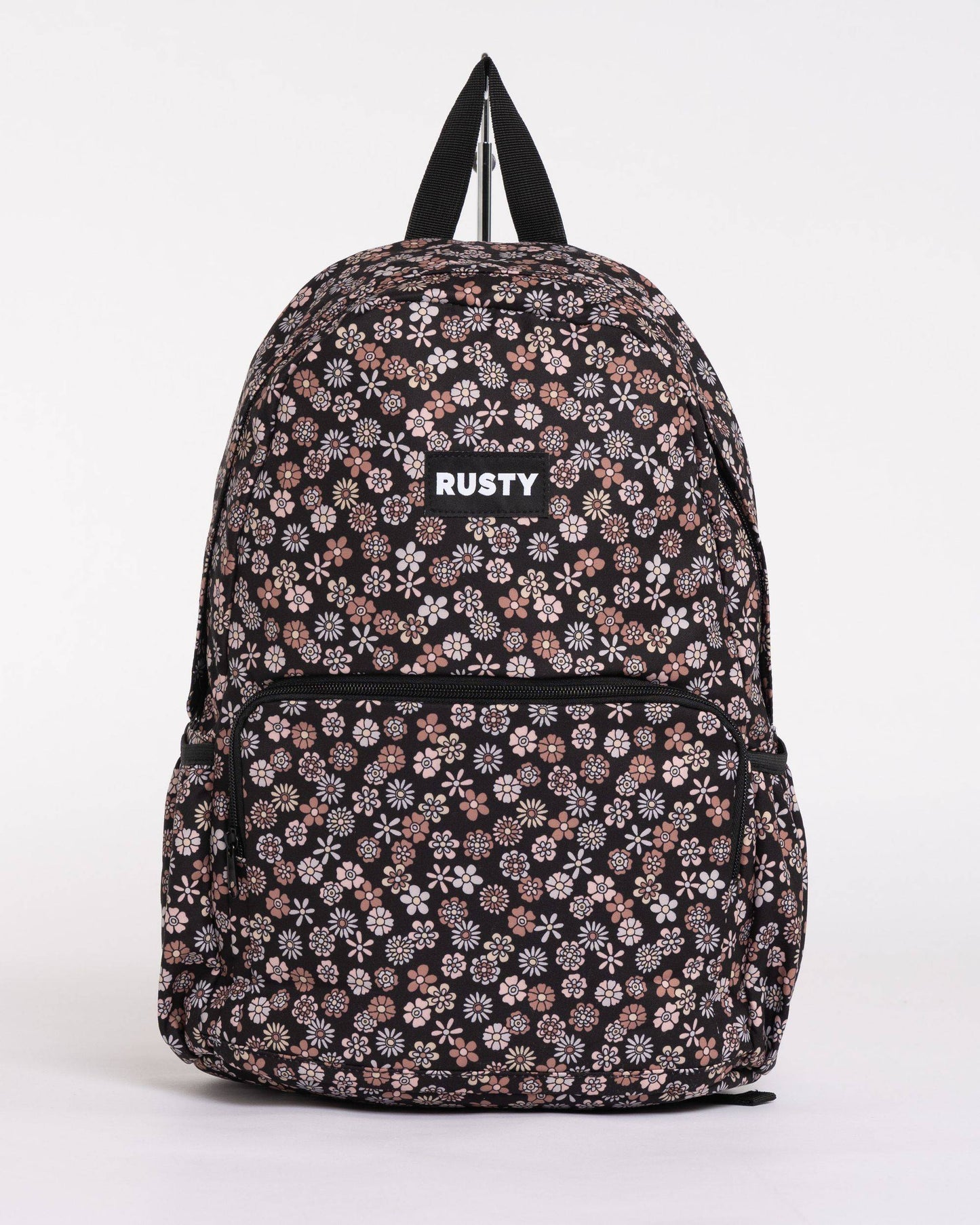 Rusty Indiana Backpack with floral print and front pocket design.