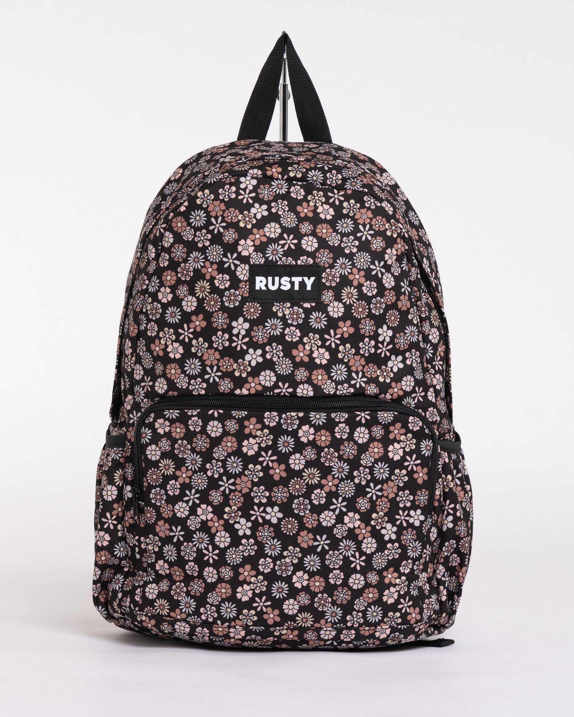 Rusty Indiana Backpack with floral print and front pocket design.