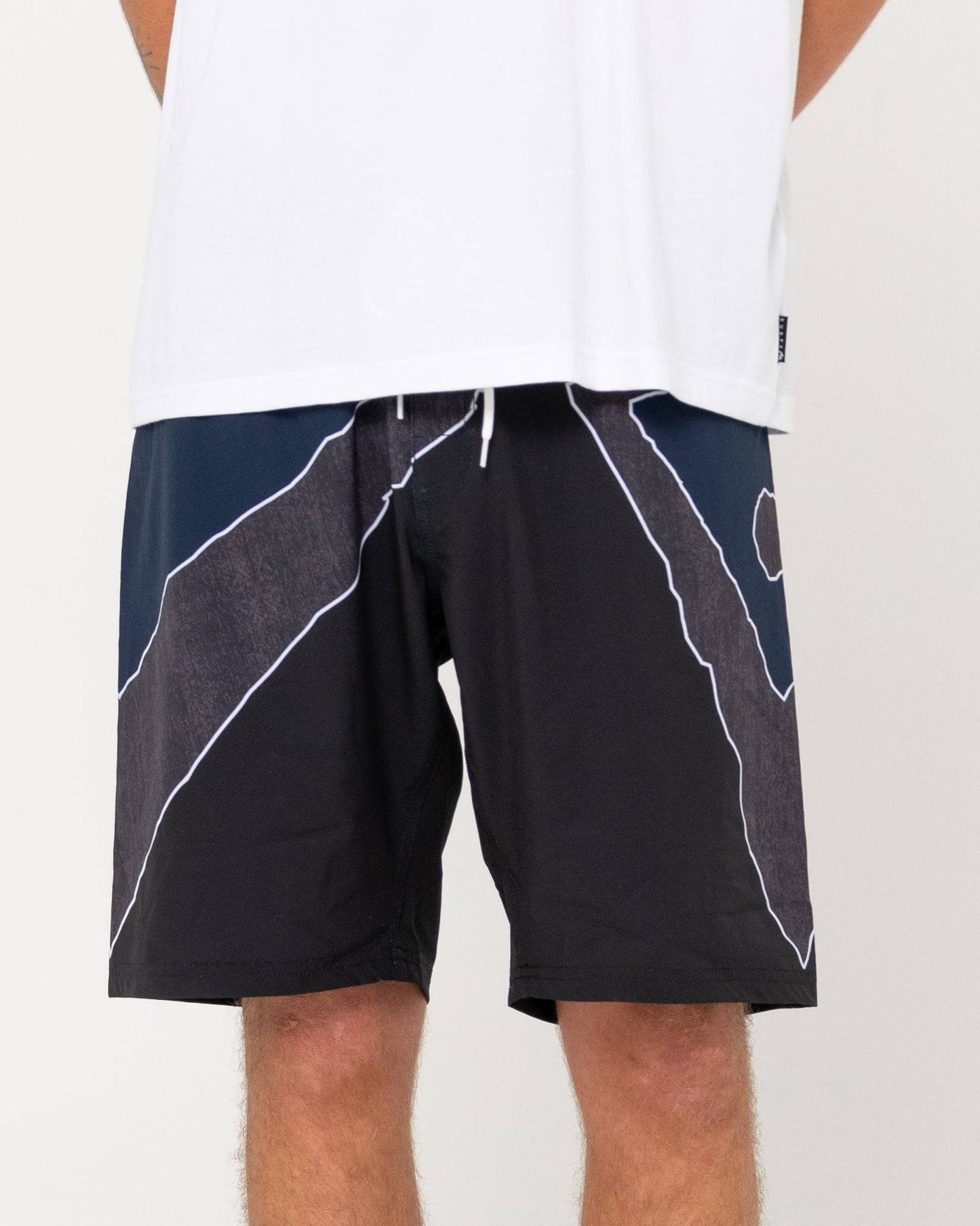 Rusty Illusion Boardshort with geometric design, back view.