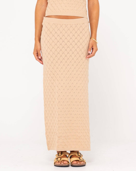 Front view of Rusty Leo Maxi Knit Skirt with diamond pattern and high waist.