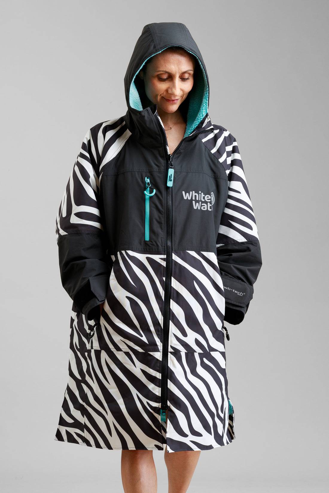 White Water Adults Hard Shell Robe in leopard print with hood and zipper.