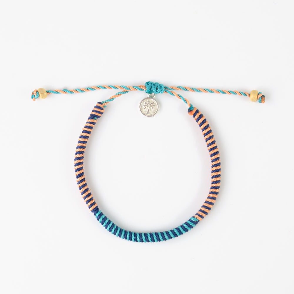 Pineapple Island Bracelet SNG-024 with colorful braided design and charm.