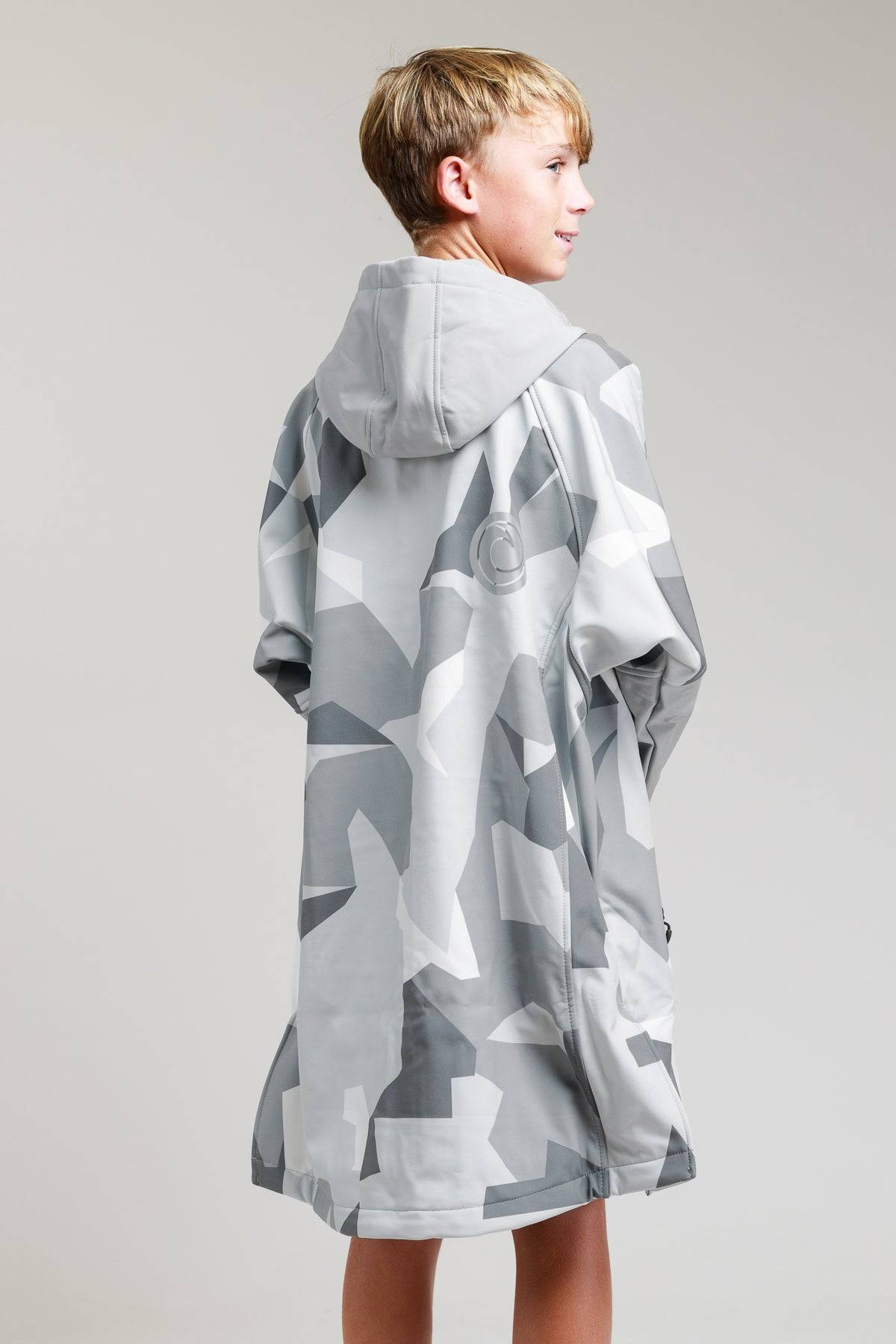 White Water Kids Soft Shell Robe in Arctic Camo, back view on boy.