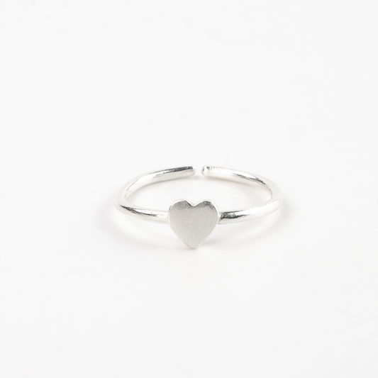 Silver adjustable ring with a heart-shaped design by Pineapple Island.