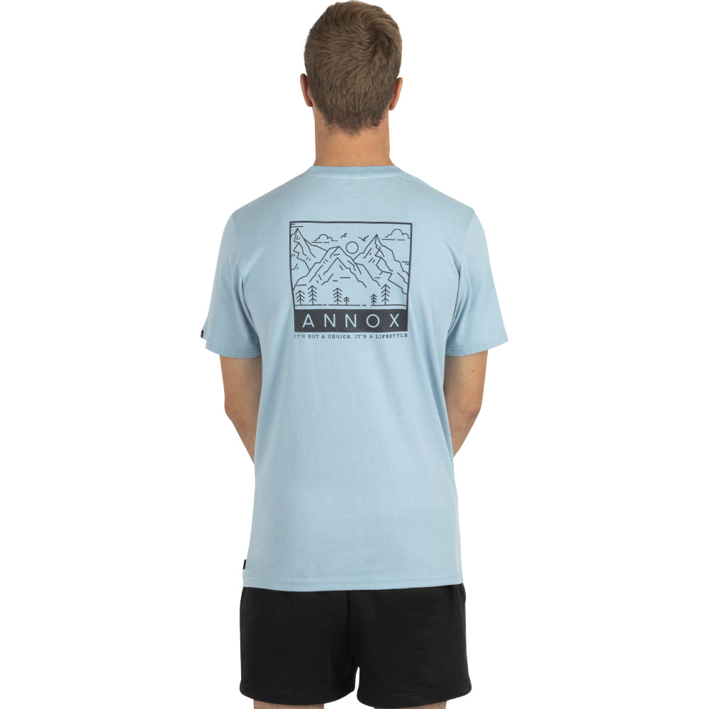 Back view of light blue Annox T-shirt featuring mountain graphic design.
