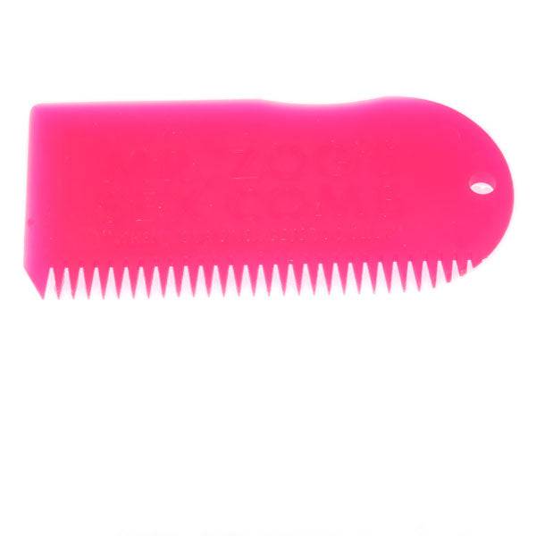 Pink Sexwax Wax Comb with ergonomic design for surfboard waxing.