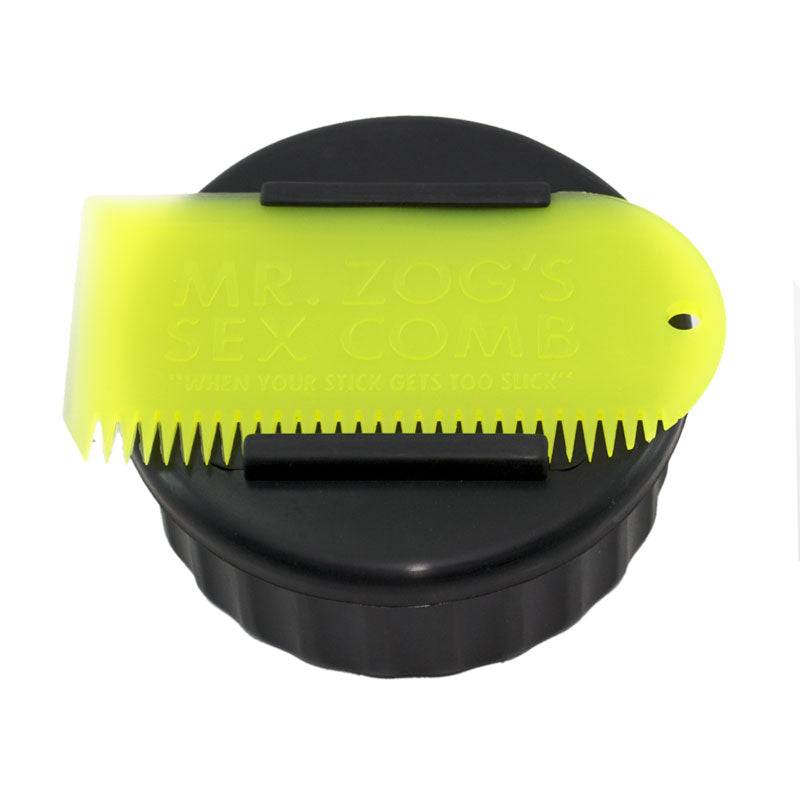 Black Sexwax wax container with yellow comb for surfboard waxing.