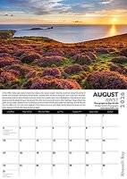 August page of Dan Santillo Gower 2026 Calendar featuring blooming heather at Rhossili Down, with monthly calendar and scenic photo notes.