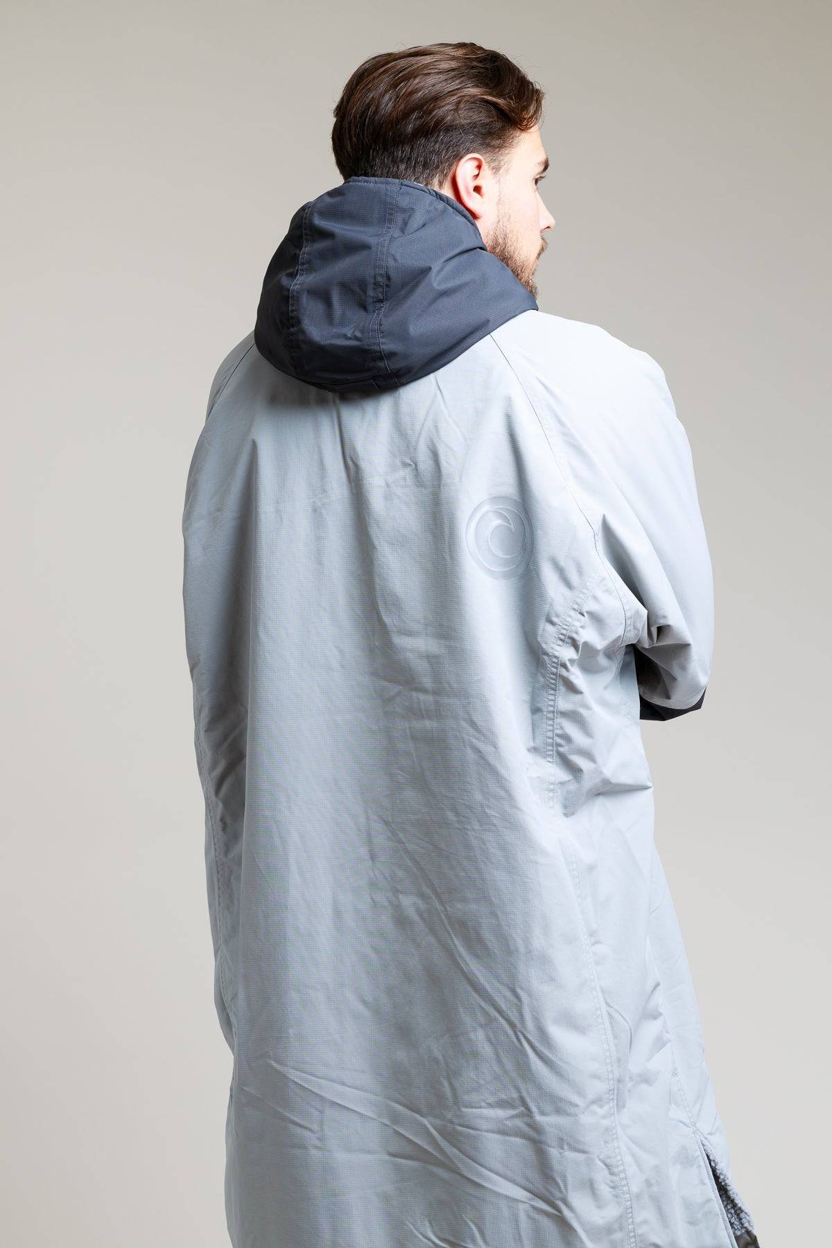 Back view of the White Water Adult Hard Shell Robe in grey with hood.