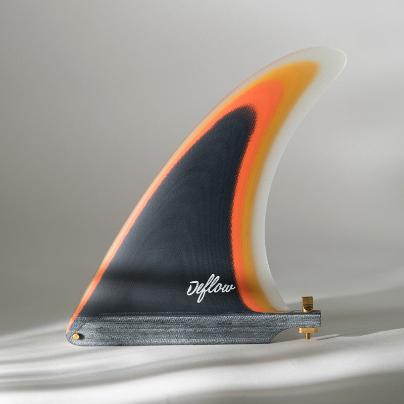 Deflow IÑIGO AGOTE single fin 7.5-inch featuring bold orange and black pattern.