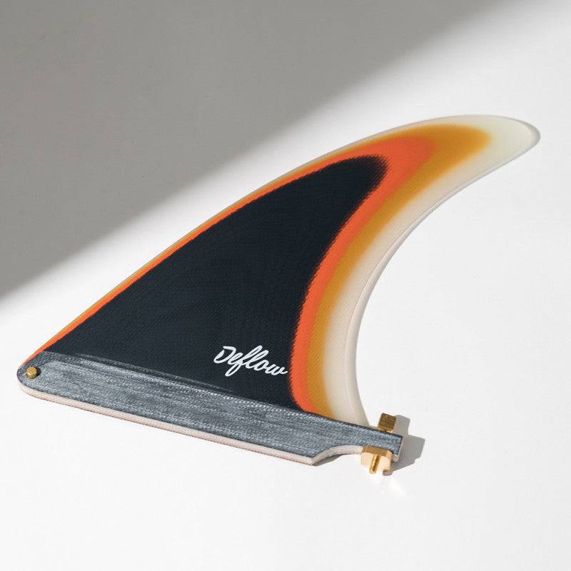Side view of Deflow IÑIGO AGOTE single fin 7.5-inch with sleek gradient colors.