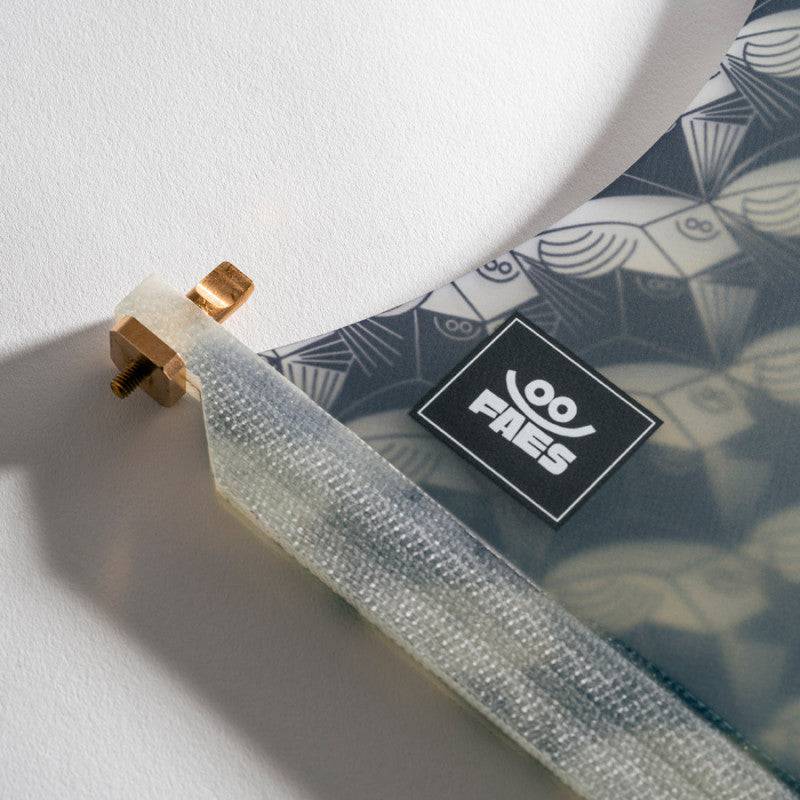 Base of Deflow JDF COLLAB single fin with branding and mounting hardware.