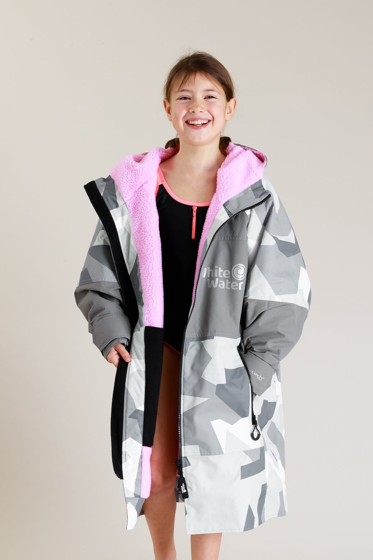 White Water Kids Hard Shell Robe in Arctic Camo with pink lining, unzipped front view.